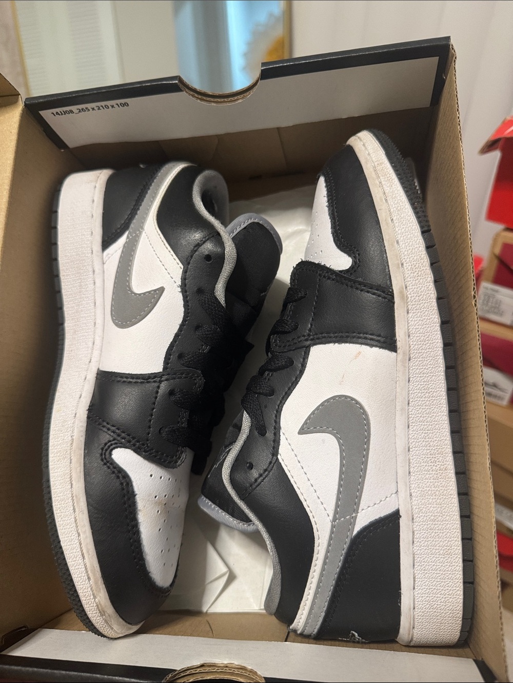 Men's Black and White Low-Top Sneakers with Gray Swoosh